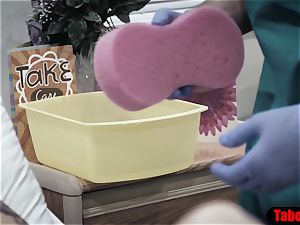 doctor gives patient a sponge bath and vaginal investigate